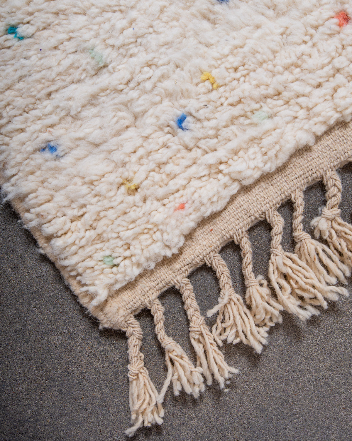 Modern, designer, handcrafted Berber rug from Morocco. Beniourain carpet with beautiful colours and patterns and fluffy wool texture.